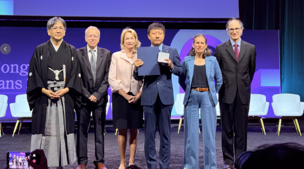 Deng Yu at the Fields Medal ceremony
