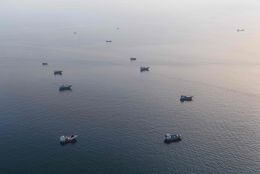 Ships anchored near the Strait of Hormuz off the Musandam Peninsula in northern Oman. VCG